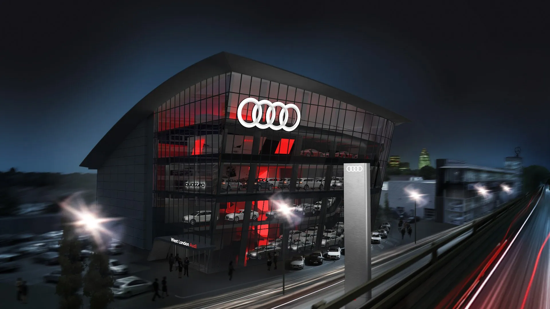 Dasselbe Autohaus bei Nacht, Schauraum von innen in Rot beleuchtet, weißes Audi-Logo an der Fassade, Lichtschweife vorbeifahrender Autos auf der Straße im Vordergrund